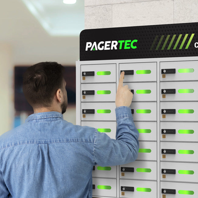 Man using Cubby 28 Bay Charging Locker - Pagertec